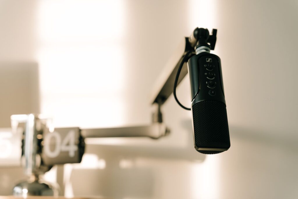 Professional studio microphone representing AI transcription of speech and podcasts
